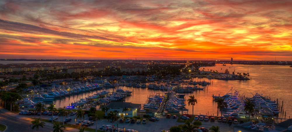 sunset over pelican yacht club