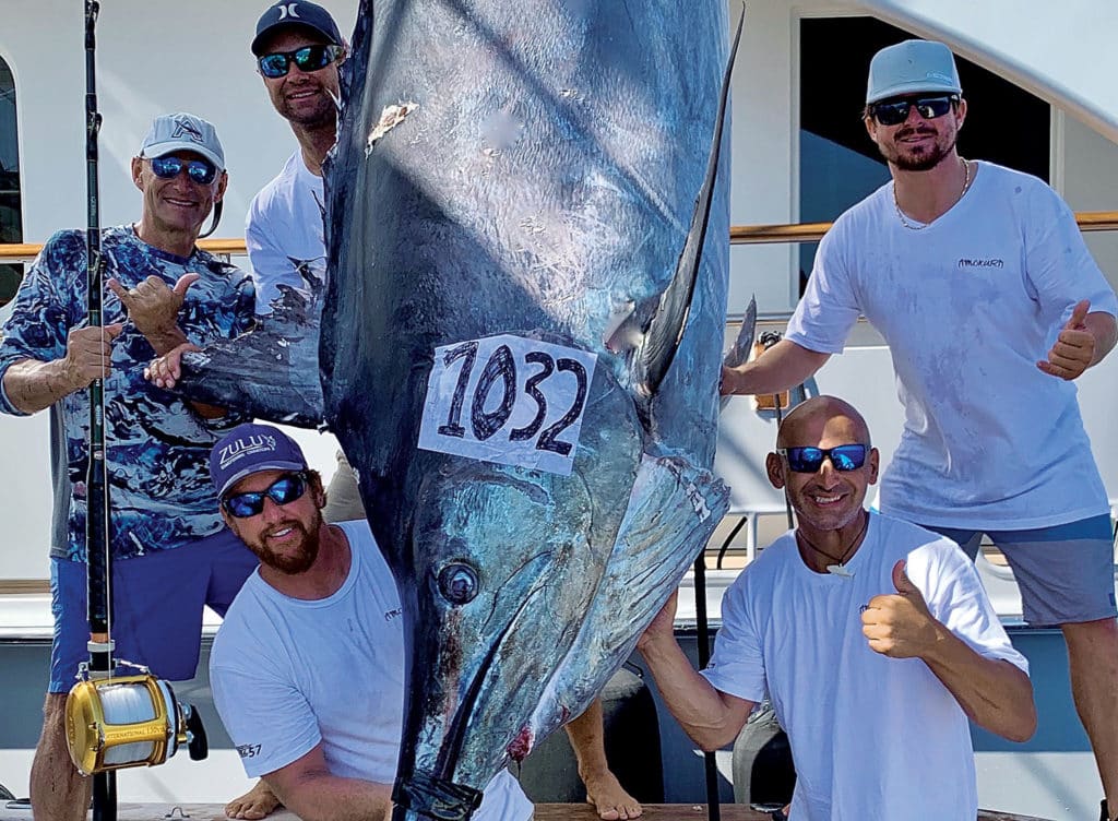 Angler Stephan Kreupl and crew with a large black marlin.