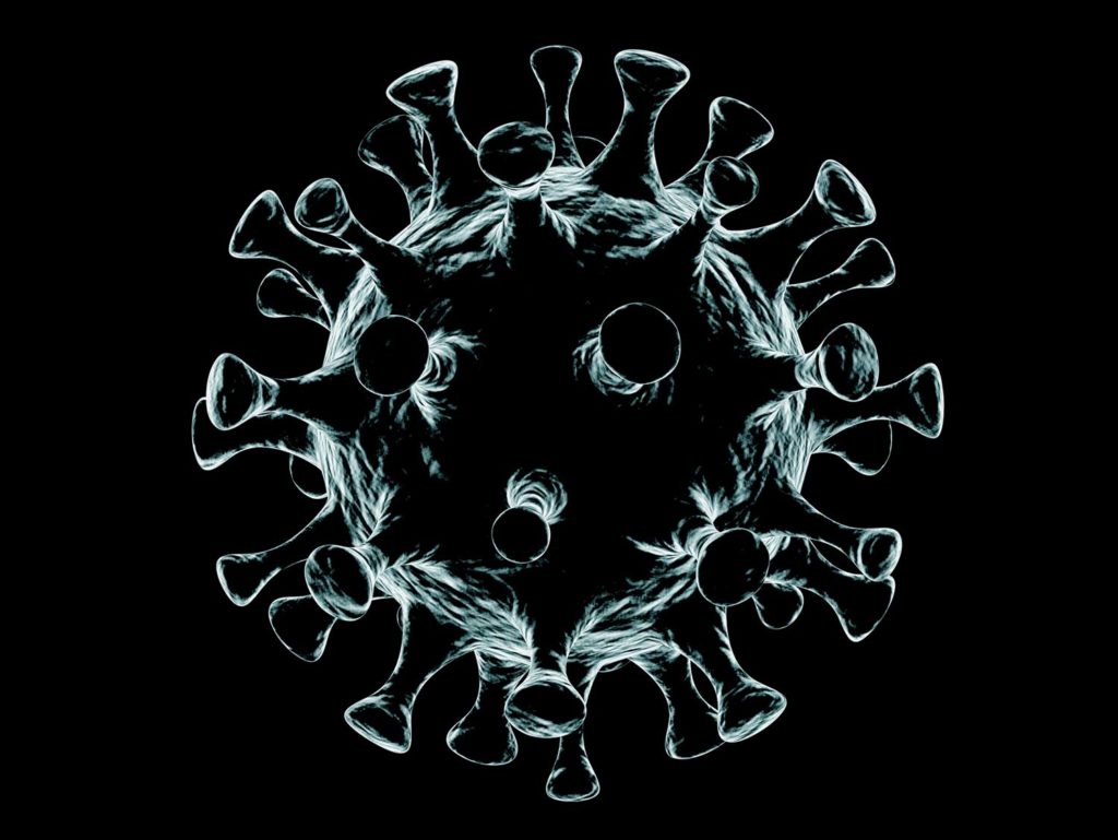 A black and white microscopic detail image of the COVID-19 Coronavirus