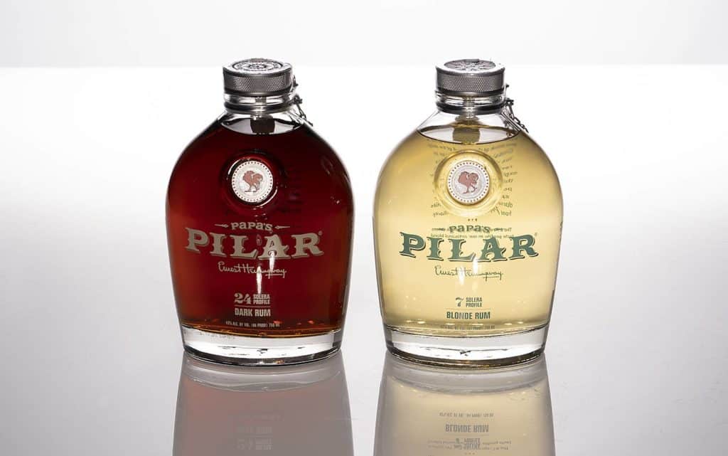 pilar dark and blonde rum bottles