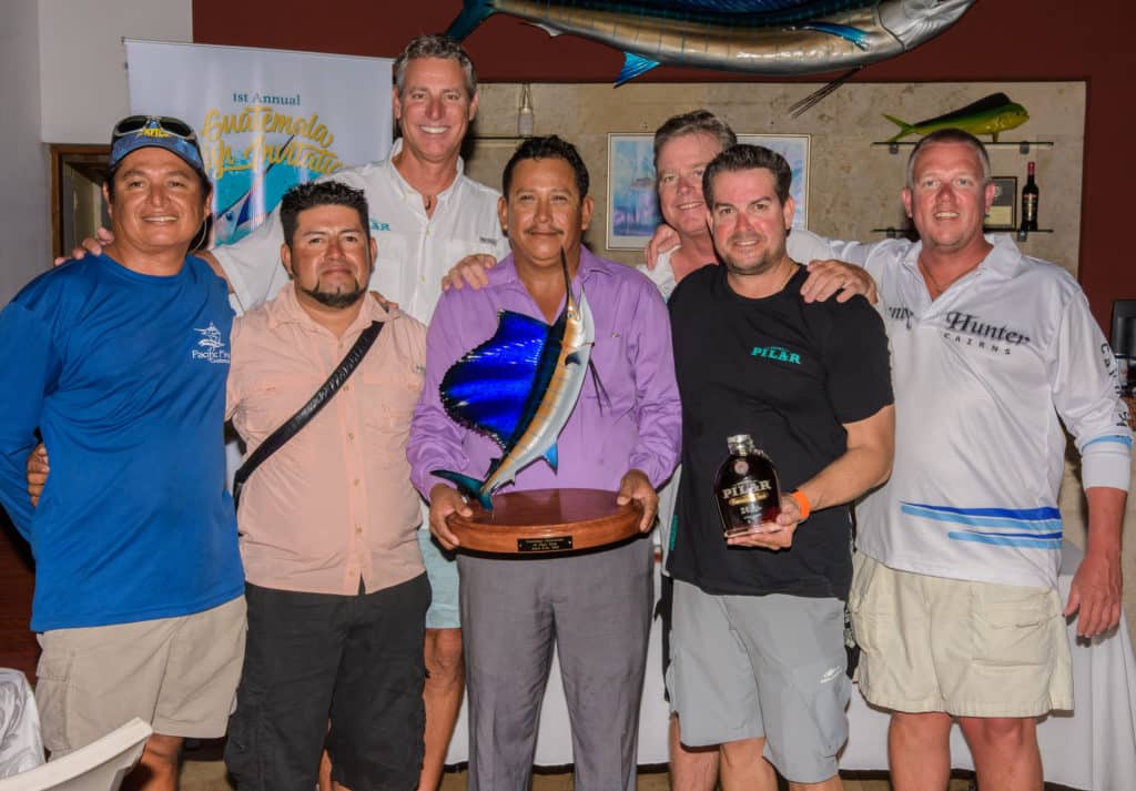 The winning team in the first annual Pacific Fins Celebrity Pro-Am Tournament.