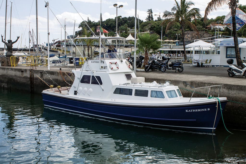 A sport fishing boat docked in Madeira.