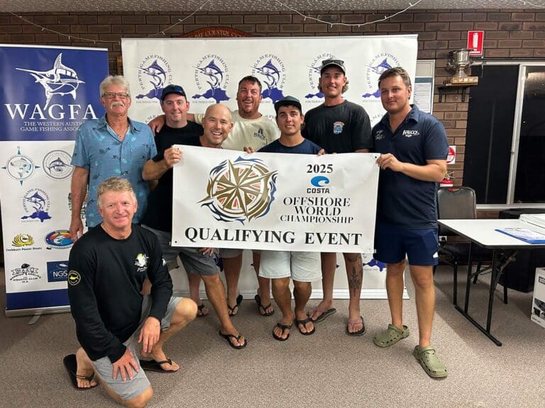 Anglers holding up an Offshore World Championship Qualifying Event banner.