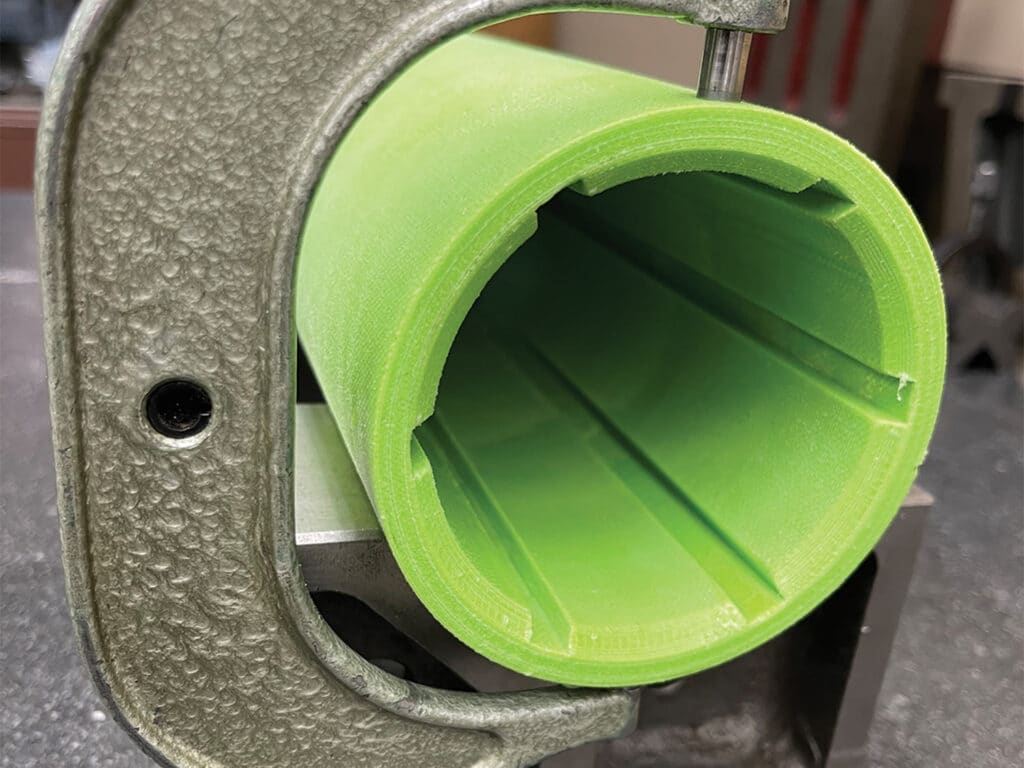 A green KryptoQuiet cutlass bearing.