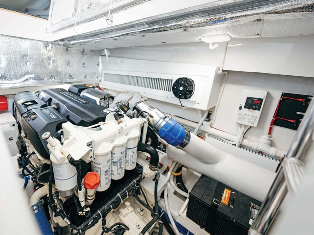 The interior engine room of a sport-fishing boat.