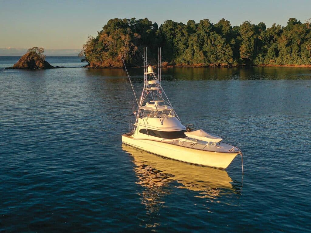 The sport-fishing boat Sea Weez anchored in a small bay.