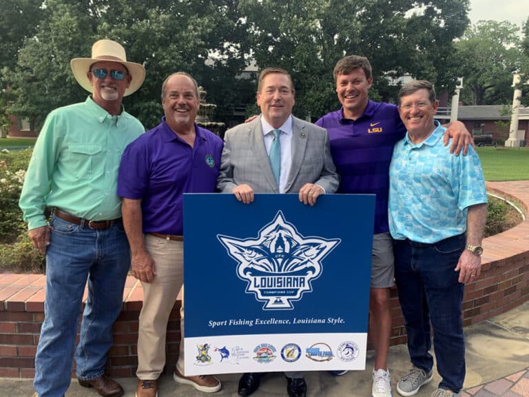 Five sport-fishing professionals standing next to each other.