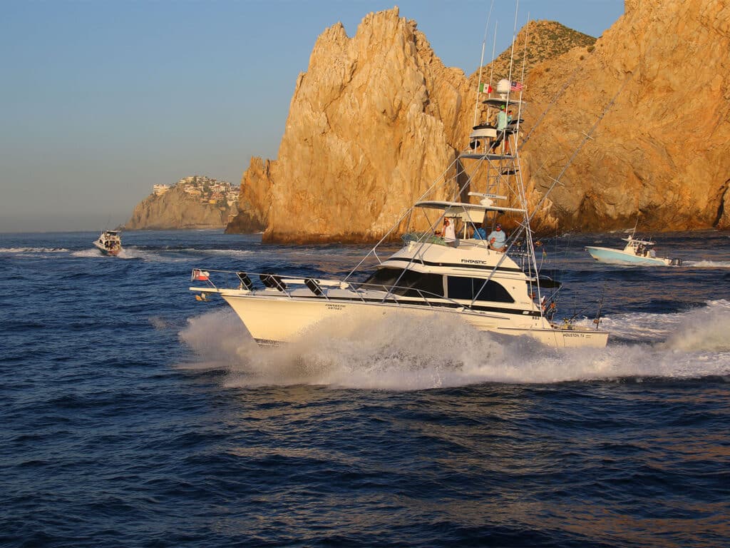 A fleet of sport-fishing boat on the water.