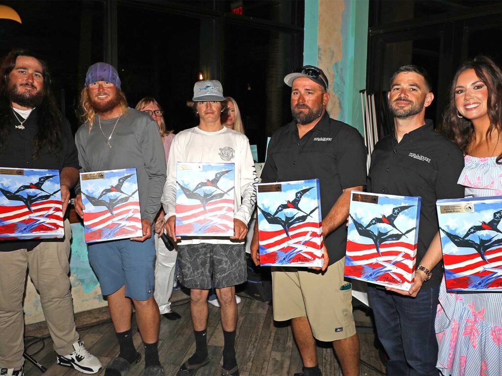 A sport-fishing team at an awards ceremony.